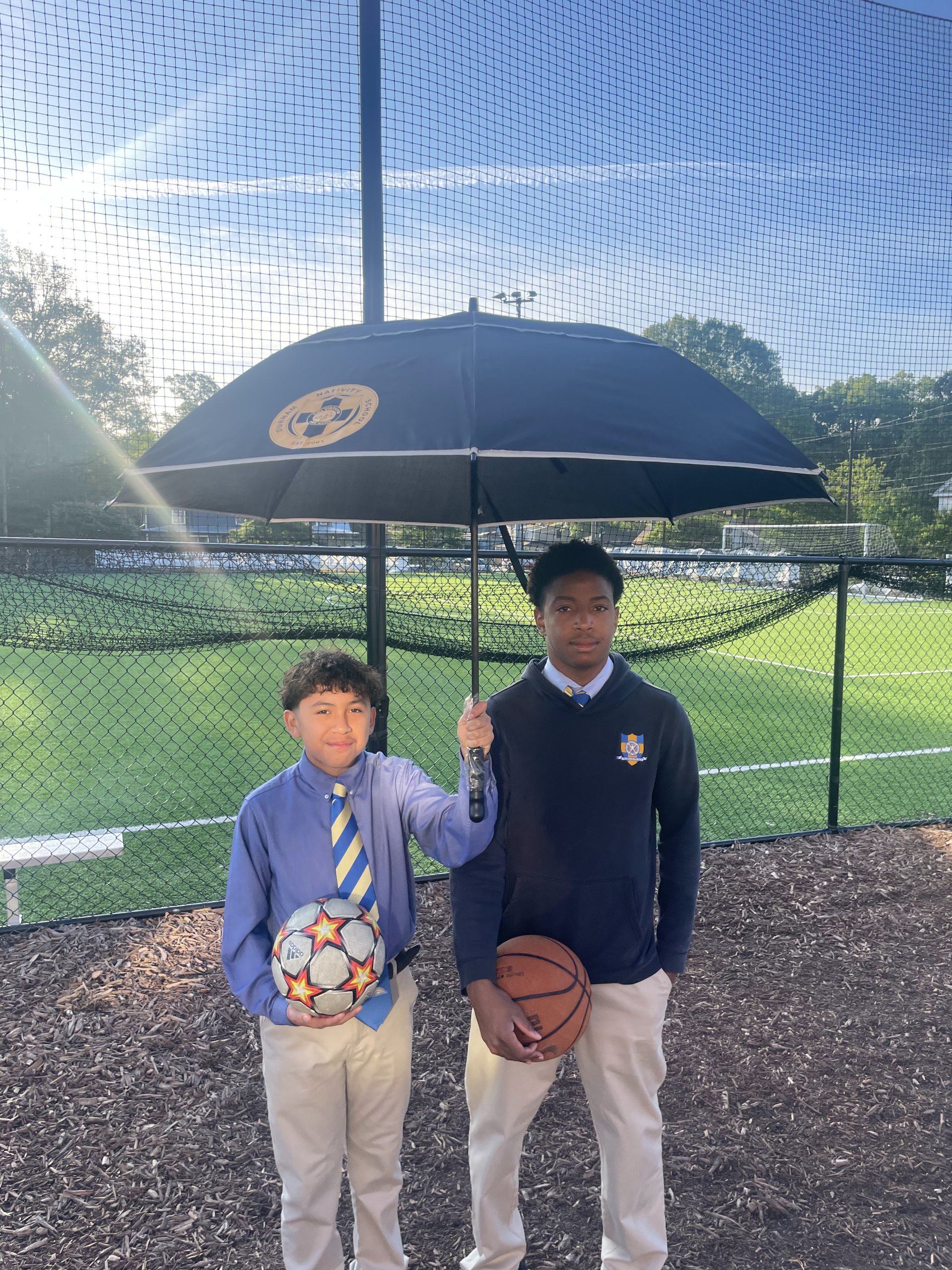 Spring Benefit photo holding umbrella